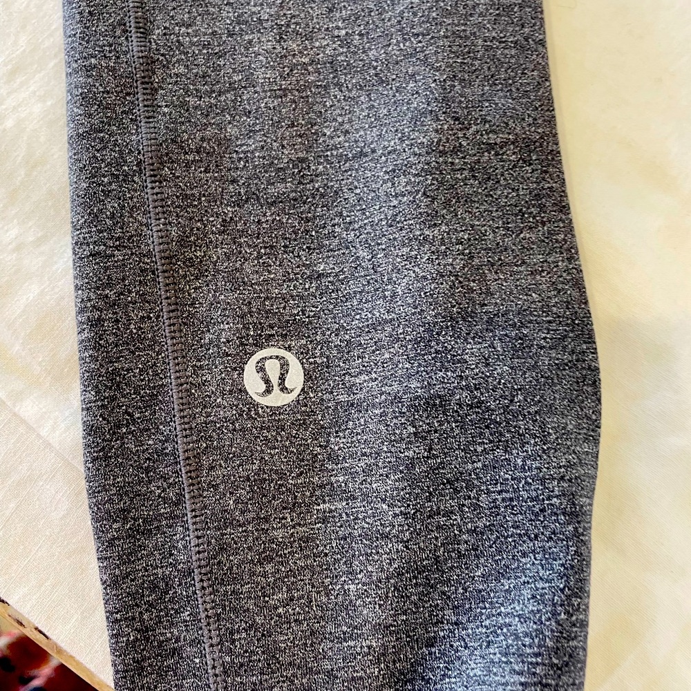 Lululemon athletic gray leggings. Repair done on the right leg. See picture.